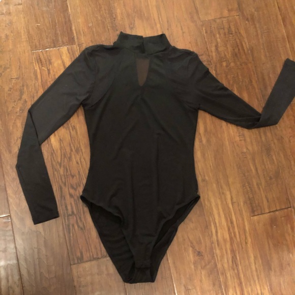 Almost Famous Tops - Black long sleeve body suit. Only worn once.